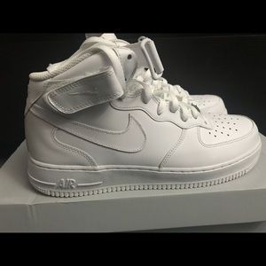 All white Air Force 1’s mid
